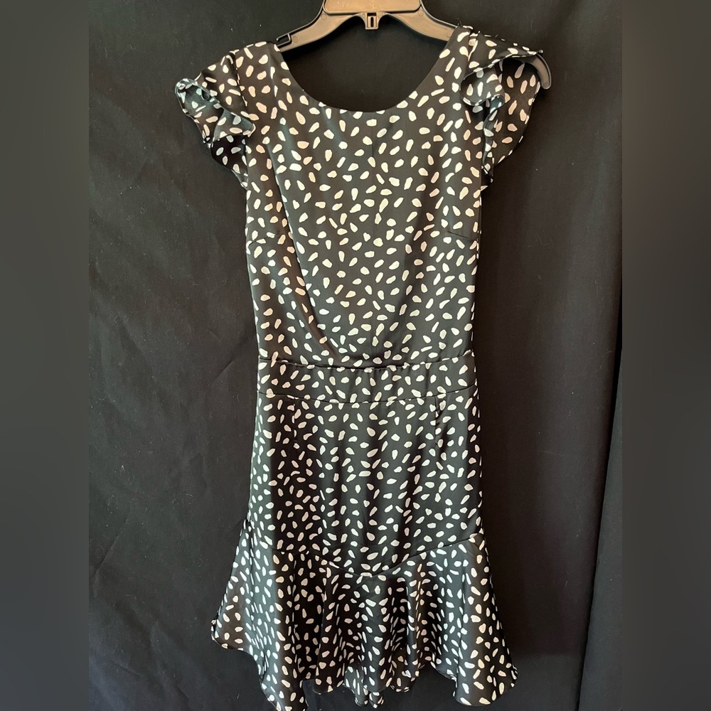 Black with white pattern TCEC dress.